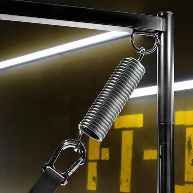 Sling Springs hooked to a sling stand frame with the strap clipped below