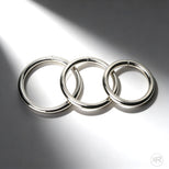 Steel Cock Rings Set featuring polished metal rings in multiple sizes, smooth rounded design for durability and comfortable fit