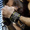 Tactical Wrist Cuff worn by a bearded model, black neoprene cuff with D-ring and carabiner