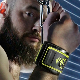 Tactical Wrist Cuffs clipped overhead, model with wrists bound above his head
