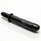 The Violator 13-Mode XL Dildo Thruster shown at an angled view highlighting its realistic texture, pronounced head, and ergonomic grip handle
